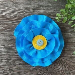 Bright Blue Ribbon Flower Hair Clip with Yellow Button Center